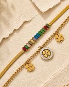 Multicolored Baguette Gemstones Set in a Sleek Gold Chain: A Touch of Luck and Elegance 🌟