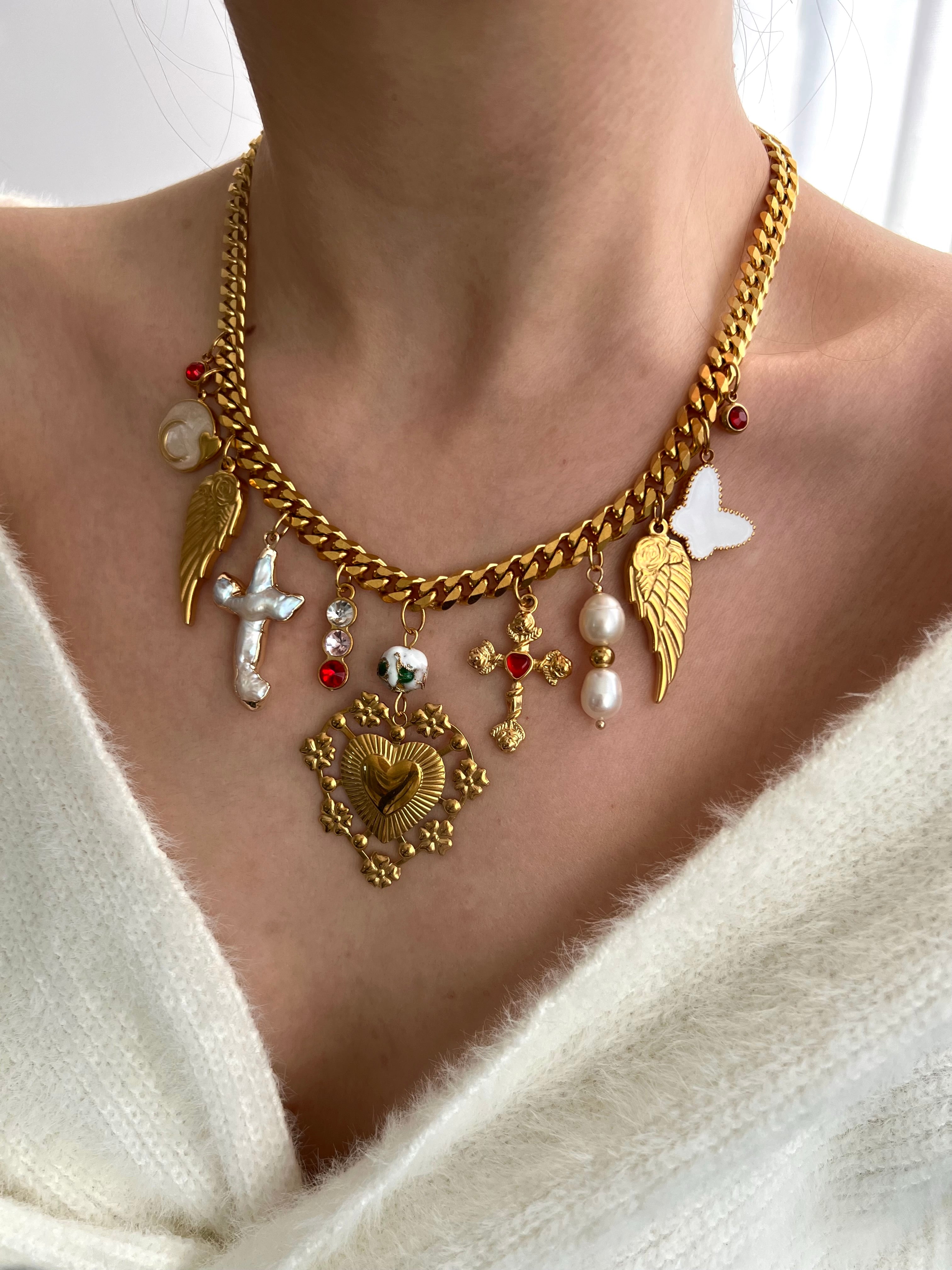 ANGEL'S EMBRACE MULTI CHARM NECKLACE