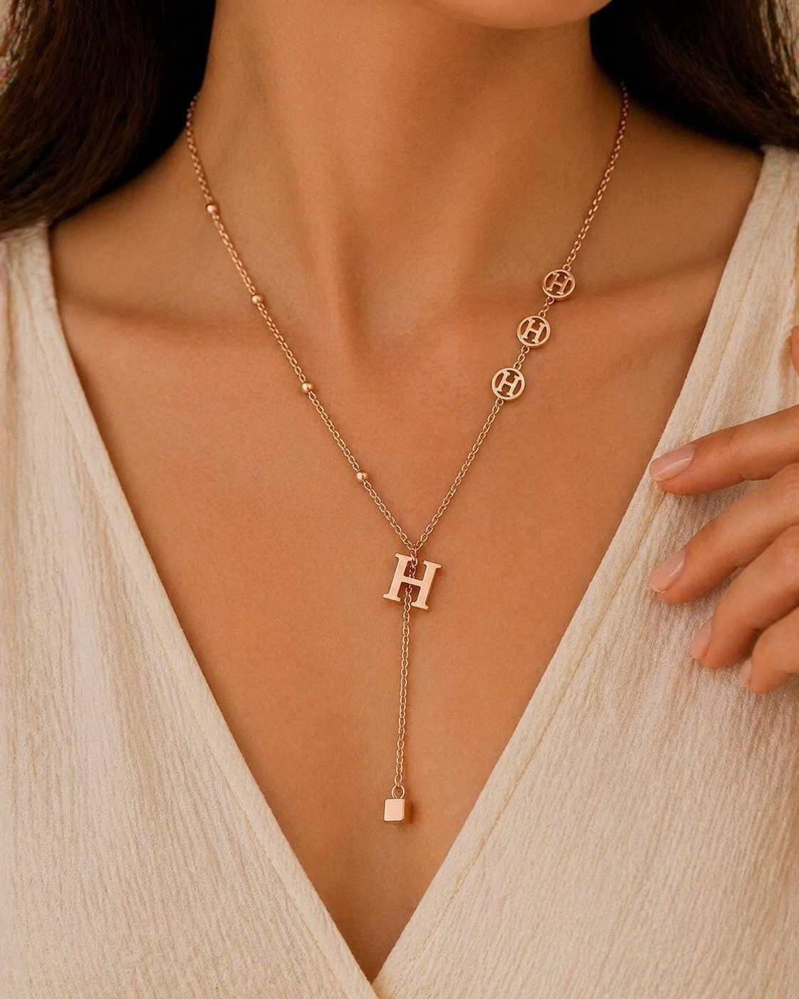 MM Jewelry: Elegant Rose Gold Necklace with “H” Medallions and Pendant