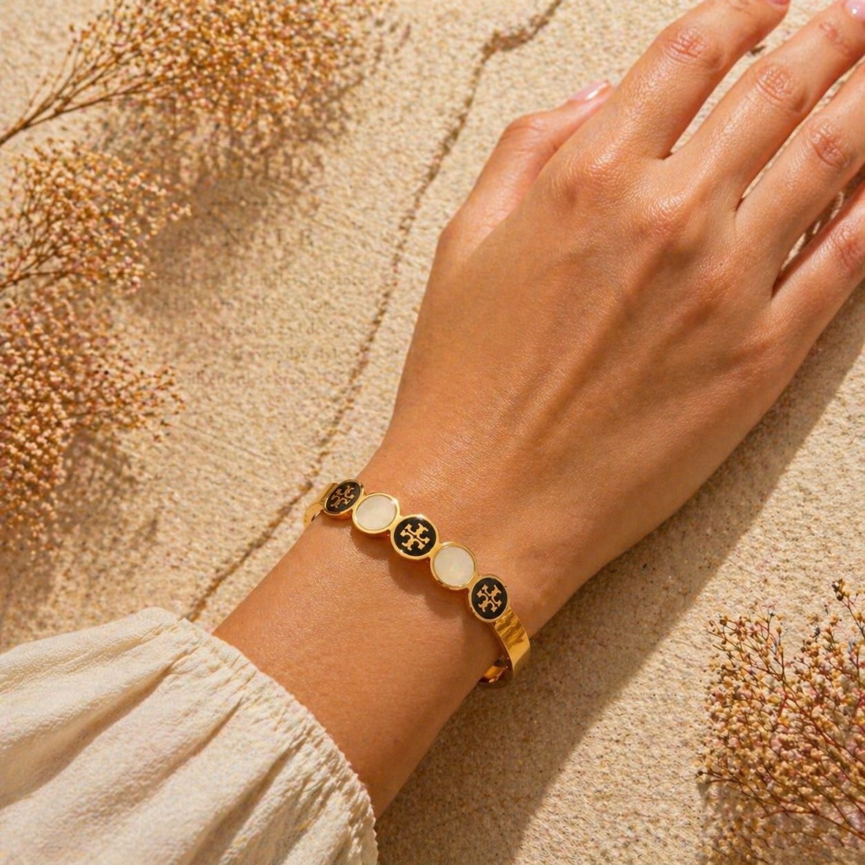 Elegant Gold Bangle with Timeless Enamel Accents