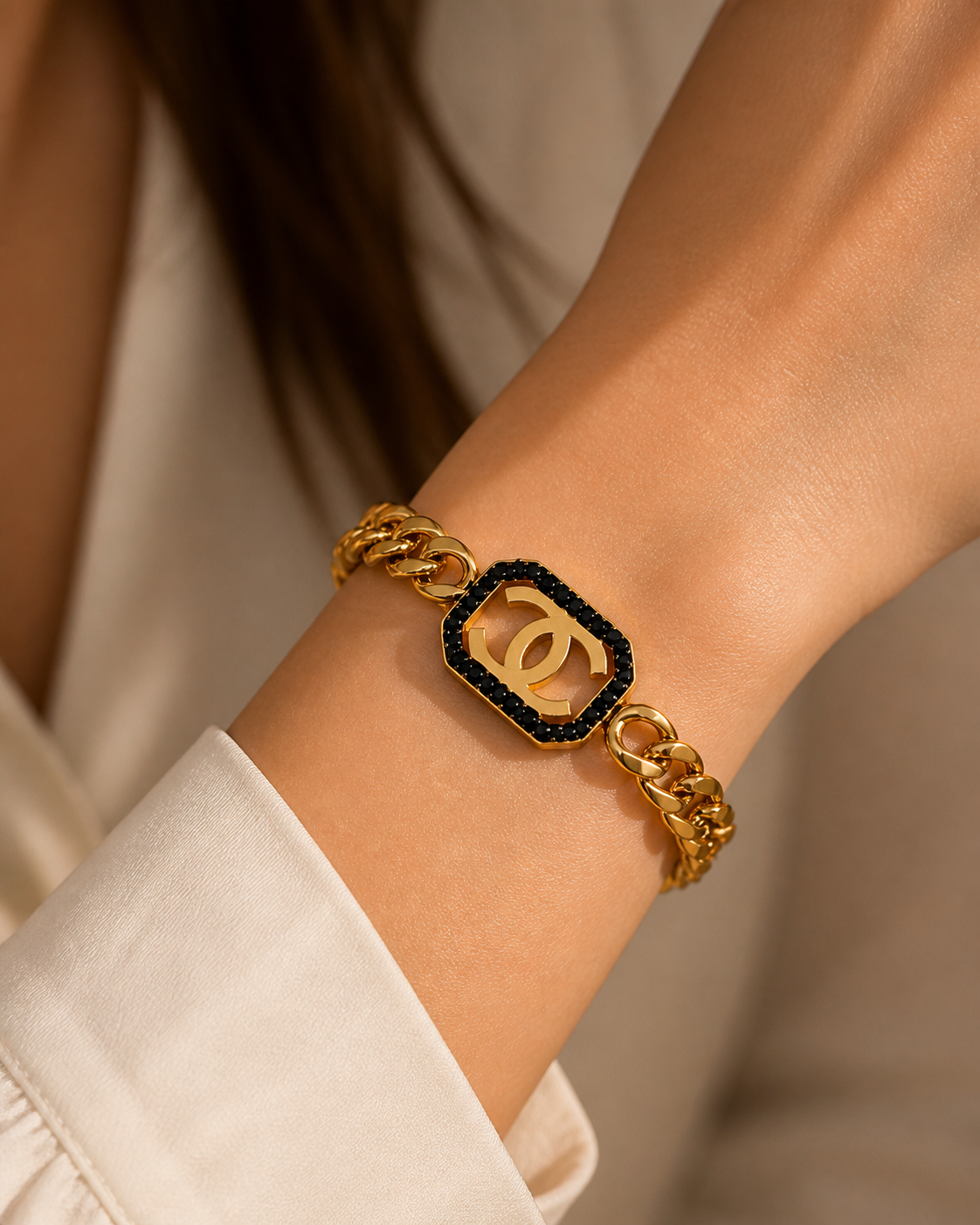Luxury Gold Chanel Chain Bracelet with Black Gemstone Accent