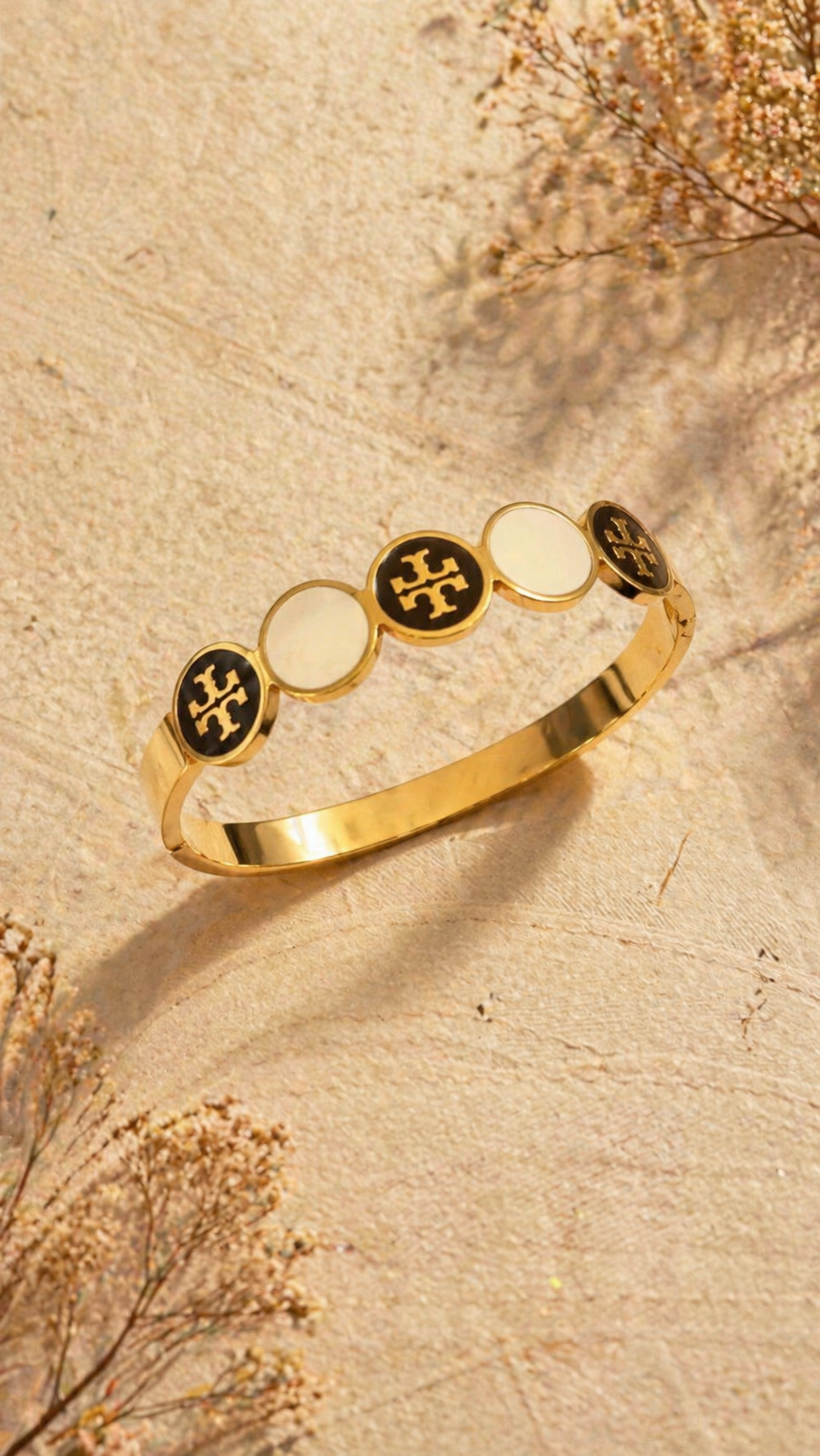Elegant Gold Bangle with Timeless Enamel Accents