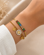 Multicolored Baguette Gemstones Set in a Sleek Gold Chain: A Touch of Luck and Elegance 🌟