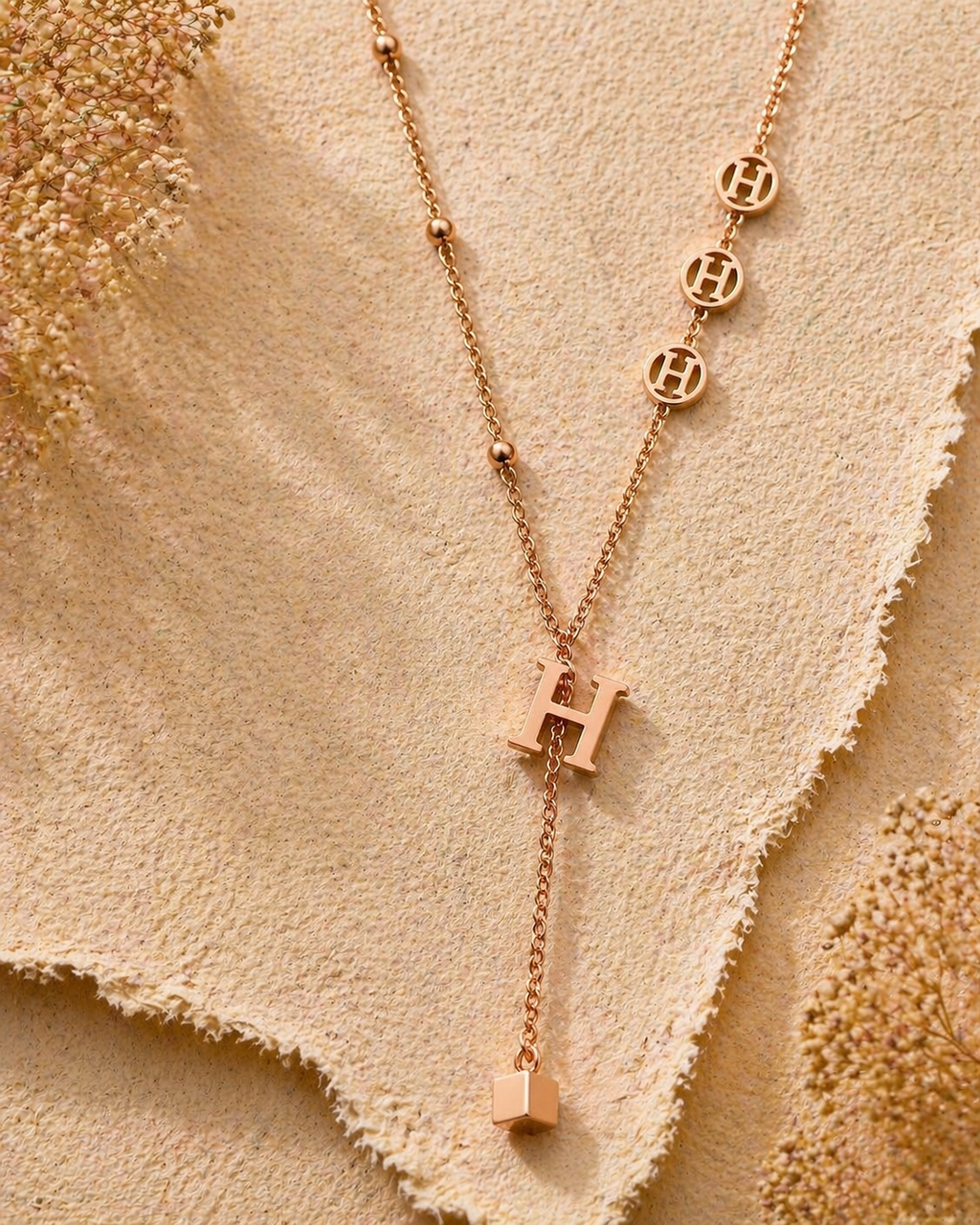 MM Jewelry: Elegant Rose Gold Necklace with “H” Medallions and Pendant