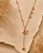 MM Jewelry: Elegant Rose Gold Necklace with “H” Medallions and Pendant