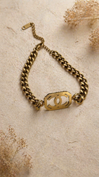 Luxury Gold Chanel Chain Bracelet with Black Gemstone Accent
