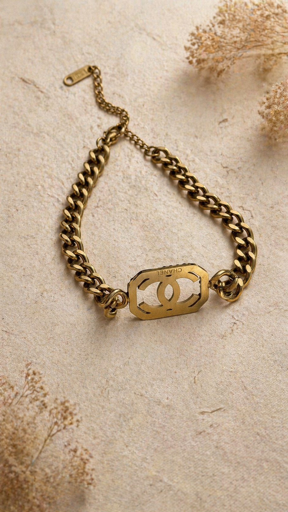 Luxury Gold Chanel Chain Bracelet with Black Gemstone Accent
