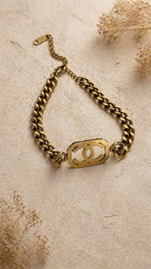 Luxury Gold Chanel Chain Bracelet with Black Gemstone Accent