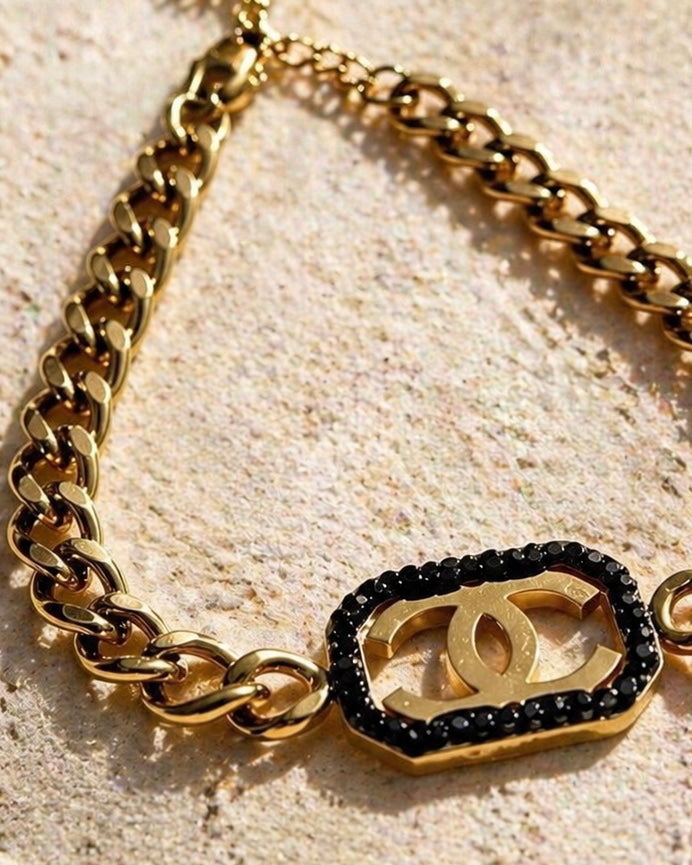 Luxury Gold Chanel Chain Bracelet with Black Gemstone Accent