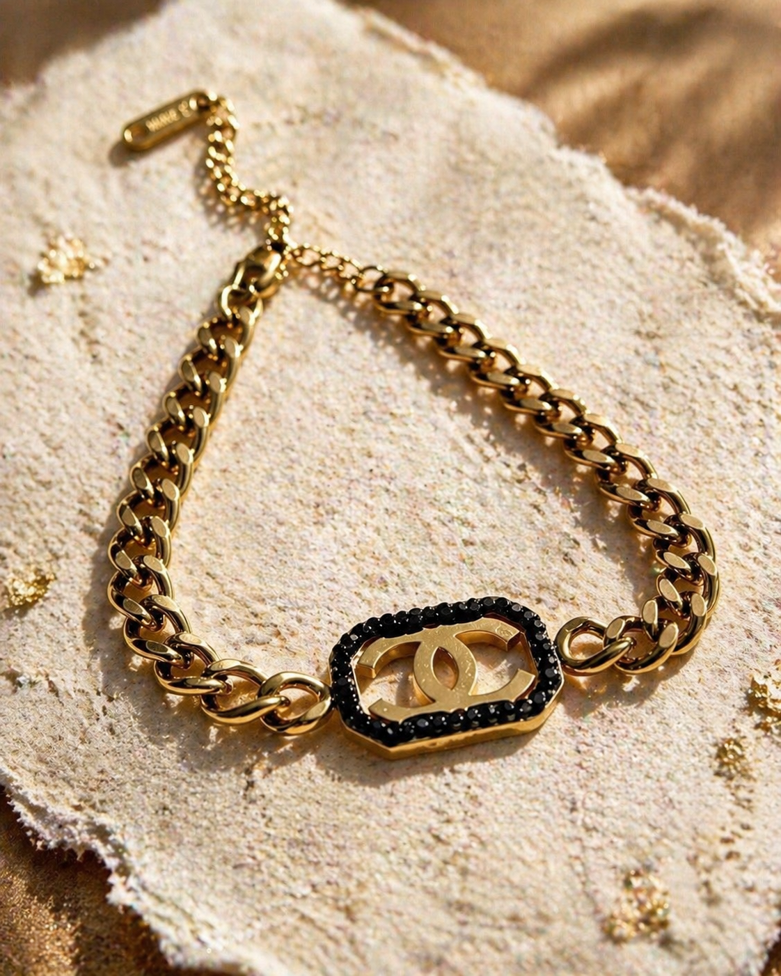 Luxury Gold Chanel Chain Bracelet with Black Gemstone Accent